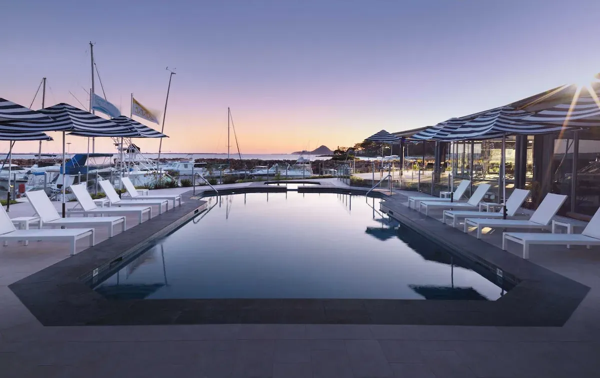 Pool and loungers beside the marina at Anchorage Port Stephens